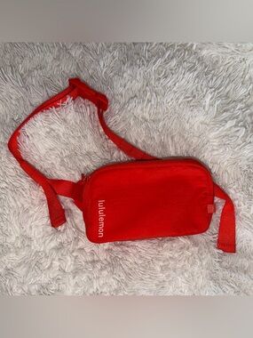 lululemon athletica solar orange mini belt bag
